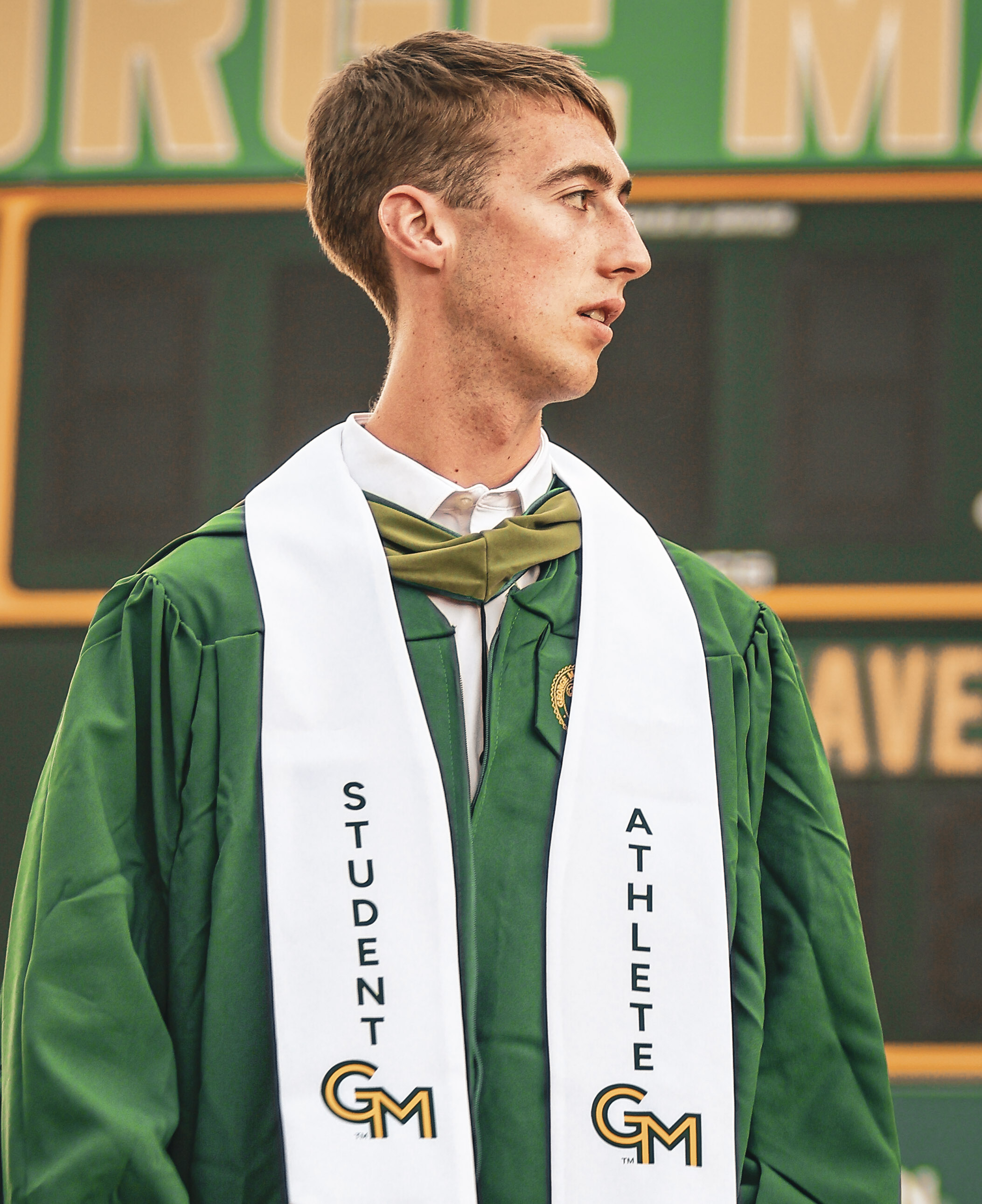 Graduation photo as athlete takes one last look at the track he trained and raced on.